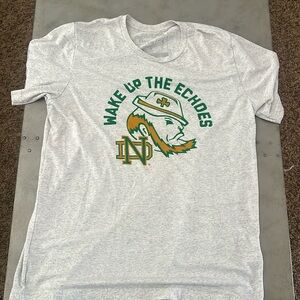 Notre dame, wake up the echoes. Size large